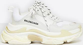 The sneakers Balencigaga Triple S black on the post
