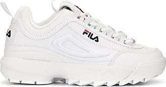 white shiny fila trainers