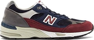 new balance leather trainers mens