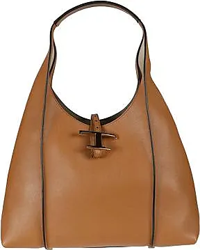 Een handtas van bruin leder, model “Satan”. Met stofhoes