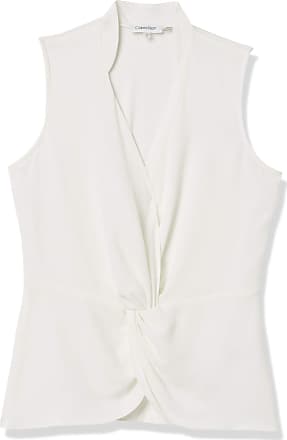 white sleeveless wrap top