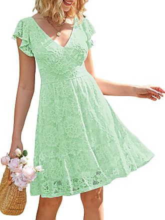 Ashley Tisdale: Floral Mini Dress, Turquoise Bag