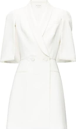 white crepe dress with cape sleeves