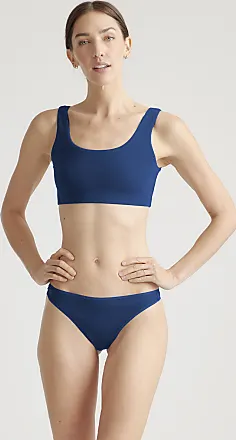 Image of A model presents this navy blue cotton longline bra and