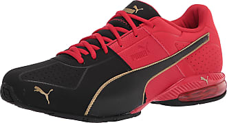 puma red sport shoes