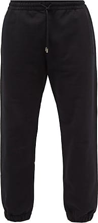 Gucci - Men - Tapered Webbing-Trimmed Monogrammed Cotton-jersey Sweatpants Black - M