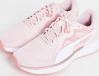 white pumas with pink