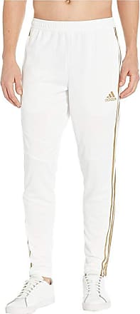 gold and white adidas pants
