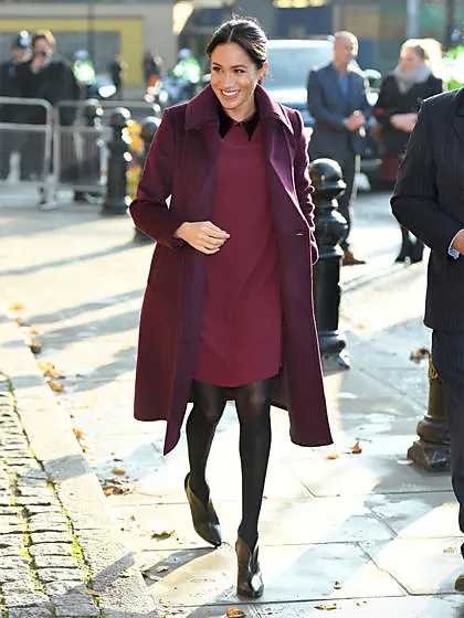 Meghan Markle in black leggings and brown boots in Vancouver on