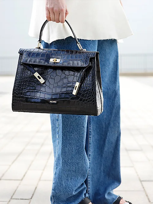How to Clean and Maintain Your Pre-Loved Designer Bag: Tips and