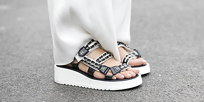 Silver sneakers are this summer's must have footwear trend