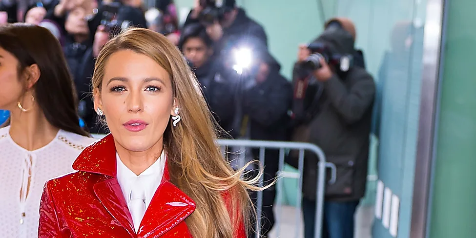 Blake Lively's red vinyl trench coat is everything | Stylight