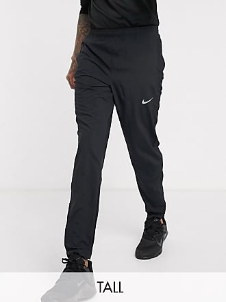 nike rose gold oversized swoosh joggers