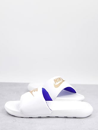 white nike flip flops mens