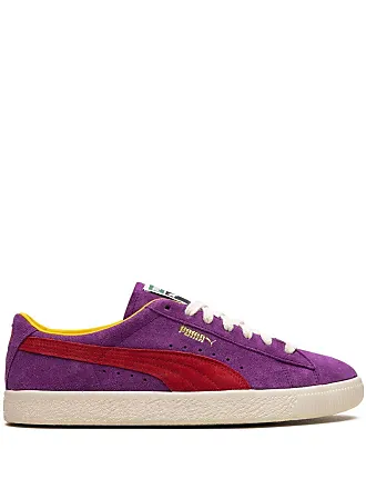 Purple and store gold pumas