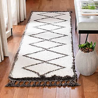 Monisha Modern Ivory/Brown Area Rug - 6'7 x 9' in 2023