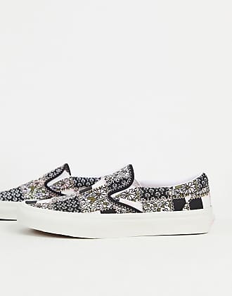 vans slip on nere