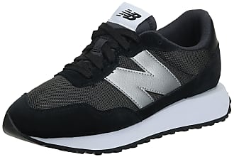 all black new balance trainers