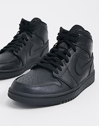 black and gray high top nikes