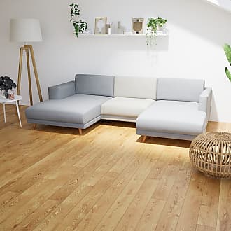 modern Leben Zimmer mit Leder Sofa und Dekoration im warm Beige