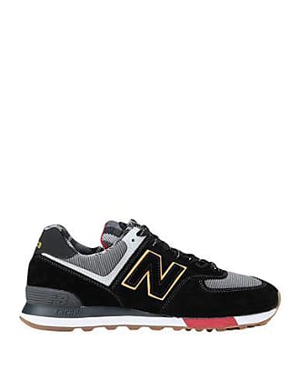 new balance negras hombre