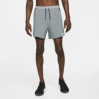 Pantalons Hommes en Gris par Nike