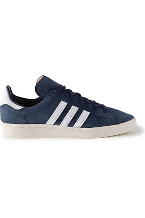 blue and black adidas trainers