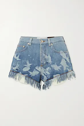 Crossover asymmetric distressed denim shorts